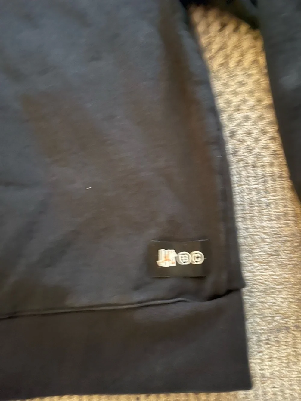 Jordan X Black undefeated Hoodie with Orange Jumpman over Camo Shield